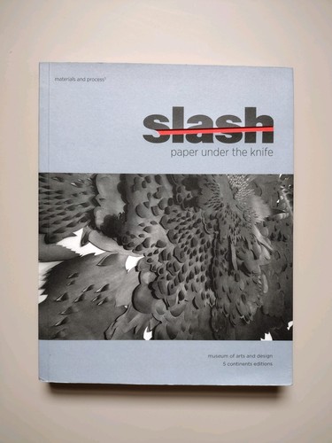 Slash paper under the knife - paper,